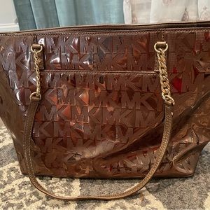 Brown Michael Kor’s bag